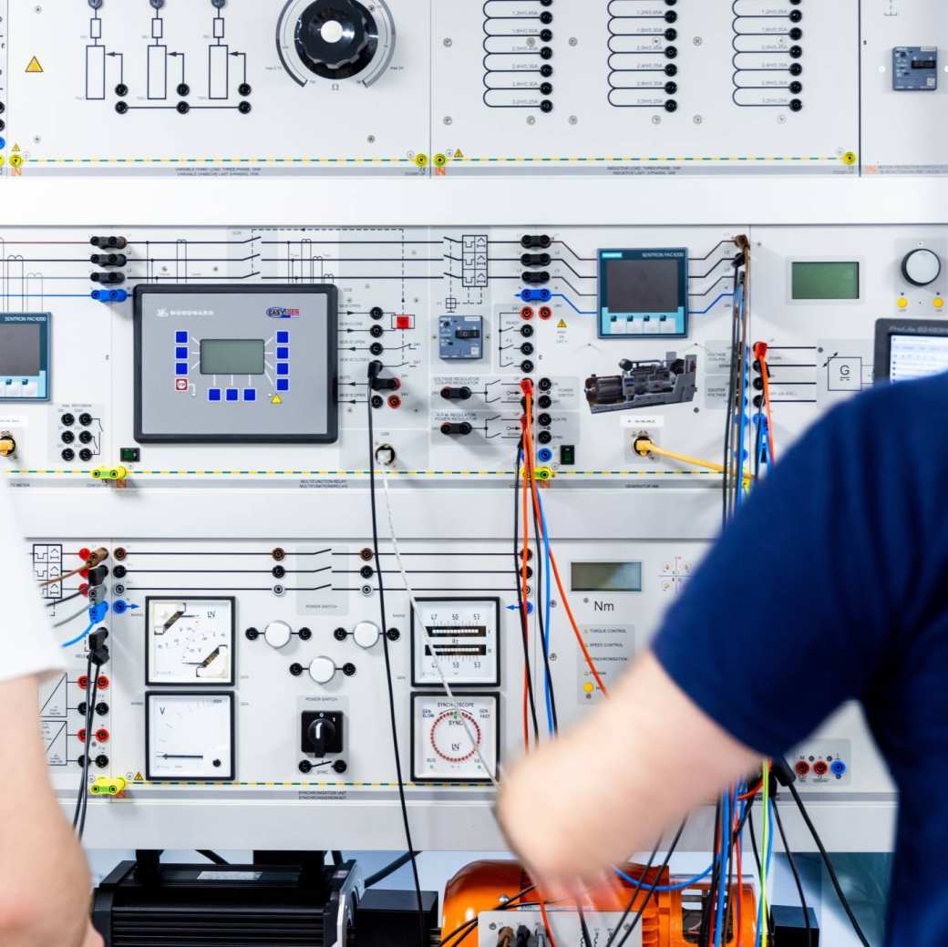 two engineering students working in the lab